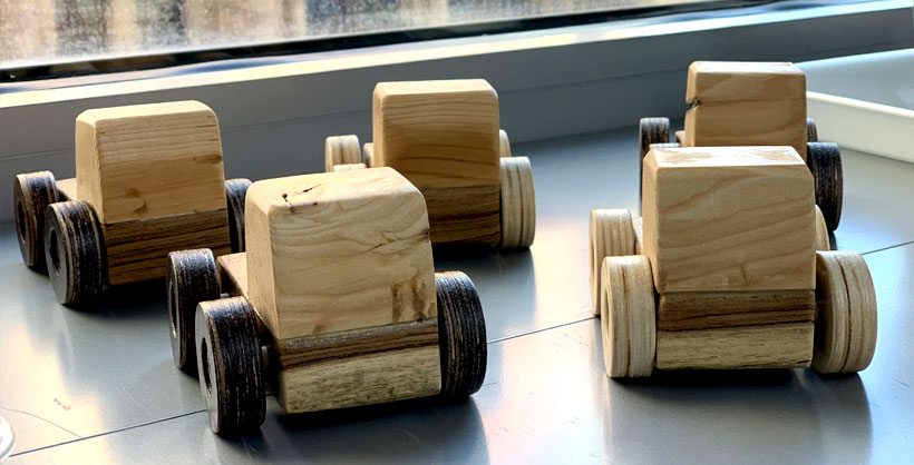 5 wooden toy cars